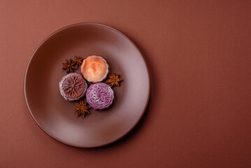 Chinese mooncake is an Asian sweet dessert. Asian mooncake as a background for your design