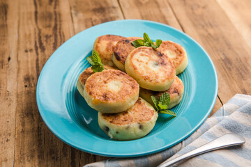 Cottage cheese pancakes. Tasty breakfast food. Syrniki