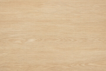 Light wood texture with natural wood grain patterns, perfect for backgrounds. A close-up view of a light brown wood grain texture. The natural patterns and details of the wood are visible