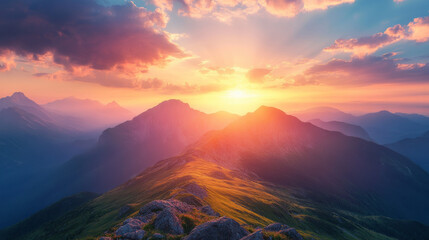 Majestic mountain range glowing under the colors of a summer sunset