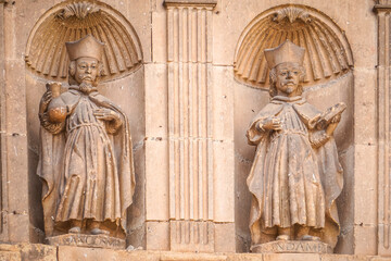 stone carvings located on the front of a church