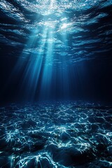 Underwater scene with ocean waves illuminated by sunrays from above