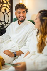 Couple Looking at Each Other in Bed