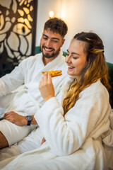 Couple Eating Toast in Bed