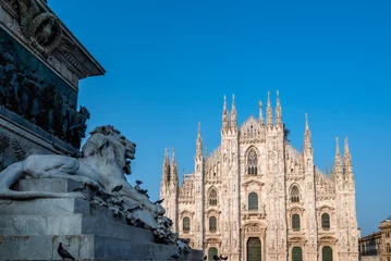 Fototapete Mailand The Milan Cathedral, also known as the Duomo di Milano, is a cathedral located in the Piazza del Duomo in the city of Milan, Italy.  © Yuliya Ihnatkovich