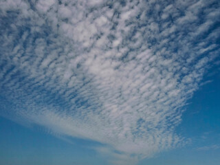 Blue cloudy sky. Nature background. Calm and balanced scene.