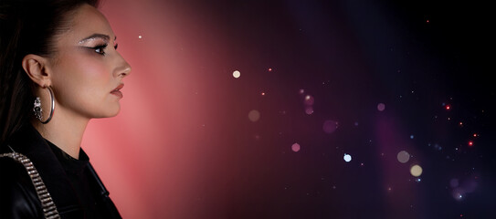 A Stylish Woman Posed Elegantly Against a Striking Cosmic Background That Inspires Wonder