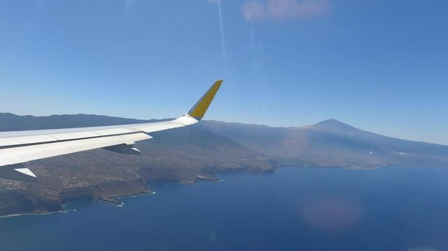 Video from inside an airplane overlooking the island of Tenerife and Spain's highest peak, Mount Teide.