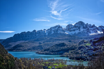 early spring in the Bubal reservoir, in Pueyo de Jaca with the snow-capped Pena Telera in the background, Pyrenean landscape in the Tena Valley in the Aragonese Pyrenees