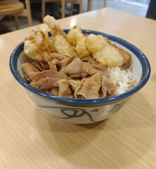 top view Pork stir-fried in Korean sauce, served over rice in a bowl on a wooden table, food, hot, delicious, valuable, copy space