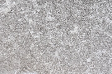 Concrete wall background and construction material. Textured gray cement on a wall. Pattern of stones for the outdoor wall. Construction industry and outdoor wall.	