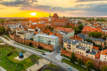 Aerial panoramic view of historical buildings and roofs in Polish medieval town Torun