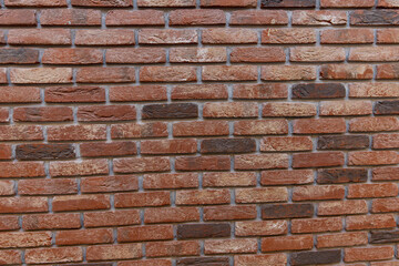 A beautifully Textured Brown Brick Wall designed to serve as an Architectural Background