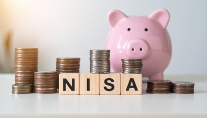 NISAのテキストが英語の入ったブロックキューブと豚の貯金箱。コピースペース、テキストスペースあり。aiで生成	