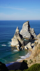 Dramatic coastal rock formations at Praia da Ursa, near Cabo da Roca, Portugal &mdash; Europe's westernmost point, featuring clear waters and stunning seascapes.