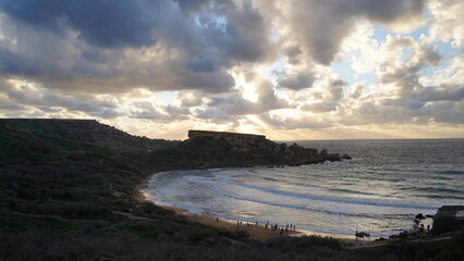 Stunning Malta sunsets over the sea, with dramatic clouds, golden light, and tranquil coastal scenes captured at day&rsquo;s end