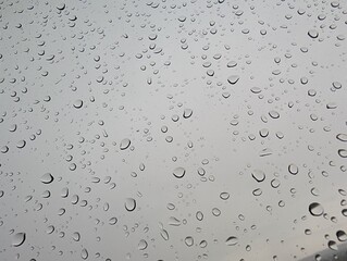 Raindrops on Glass Window During Overcast Day