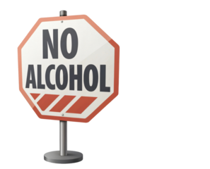 No Alcohol Prohibition Sign on Stand with Octagonal Shape and Bold Text Warning in Red and White