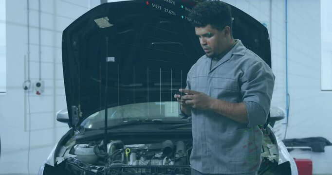 Automotive technician unlocking smartphone tapping screen generating 3D engine charts for repair