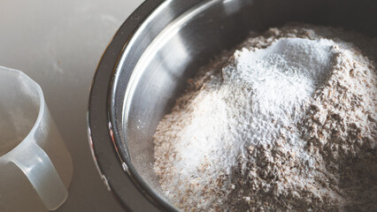 Cooking meal prep mixing ingredients flour soda baking powder bowl baking at home kitchen