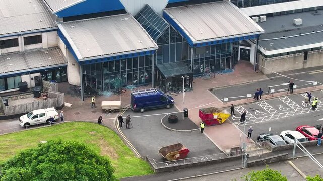 Aerial view of the aftermath of an arson attack after its use as Emergency Rest Centre for Ballymena residents from the Ballymena riots at Larne Leisure Centre Co Antrim Northern Ireland 12-06-25 