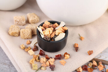 Napkin with dried fruit tea and snacks, closeup