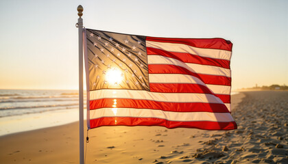 American flag waving at sunset on the beach