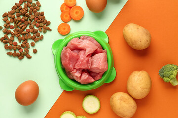 Composition with raw meat, dry pet food and natural products on color background