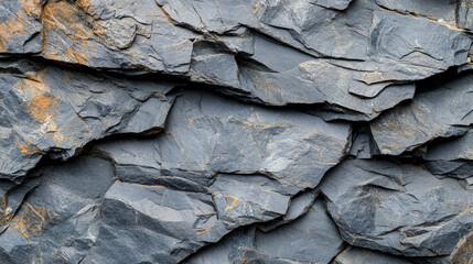 Rocky Cliff Surface Texture Background. High-resolution image of layered rock surface suitable for geological, nature, or outdoor design projects.