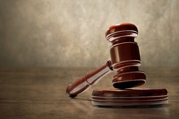Judge gavel on wooden floor