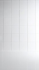 A pristine white tiled wall featuring an array of glossy square tiles, reflecting light and creating a clean, modern aesthetic in the space.
