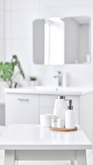 A pristine white table showcases two elegant ceramic cups beside stylish soap dispensers, creating a clean and inviting atmosphere perfect for any setting.