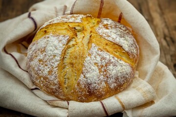 Rustic sourdough bread with natural fermentation, real food, ancestral, vintage and homemade artisan food