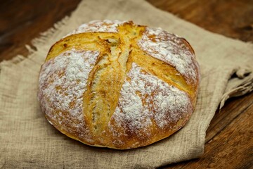 Rustic sourdough bread with natural fermentation, real food, ancestral, vintage and homemade artisan food