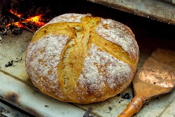 Rustic sourdough bread with natural fermentation, real food, ancestral, vintage and homemade artisan food