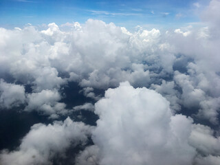 Aerial View of White Clouds in Blue Sky Above Earth – Scenic Atmospheric Landscape from Above