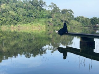 The beautiful Claket Lake reflects hills and clouds like a mirror. Its calm, clear water creates a stunning scene, blending sky and nature in perfect harmony.