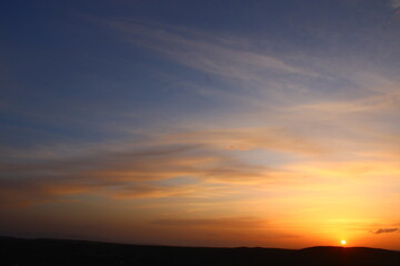 Fiery Sunset over the Horizon. Dramatic sky 