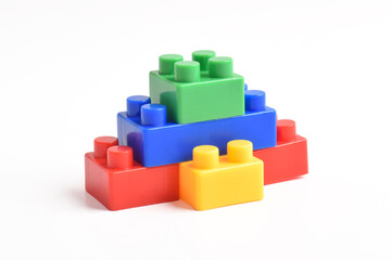 Obraz premium Plastic building blocks isolated on white background