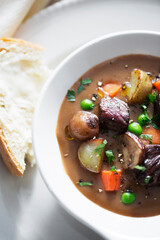 Hearty Beef Stew with Vegetables and Bread