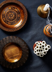 Rustic Wood Plates with Candle and Daisies