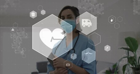 Nurse in clinic holding clipboard activating hexagonal medical icons fading and pulsing around her - Powered by Adobe