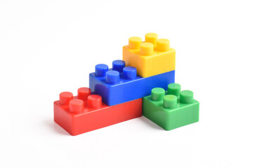 Fototapeta premium Plastic building blocks isolated on white background