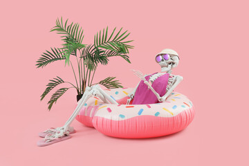 Human skeleton with swim ring and palm tree on pink background. Summer vacation concept