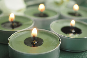 Decorative candles glowing in a peaceful setting