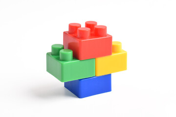 Colorful Plastic toy blocks isolated on white background. Building Blocks © Mulad Images