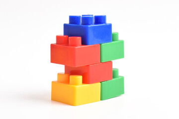 Colorful Plastic toy blocks isolated on white background. Building Blocks © Mulad Images