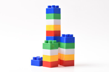 Colorful Plastic toy blocks isolated on white background. Building Blocks © Mulad Images
