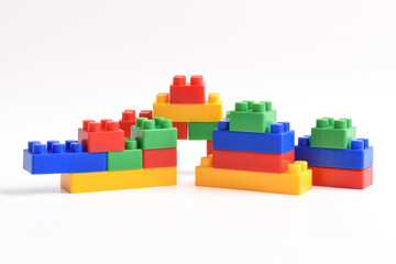 Colorful Plastic toy blocks isolated on white background. Building Blocks © Mulad Images