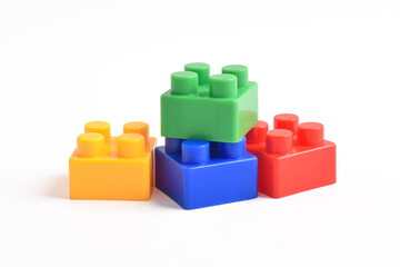 Obraz premium Plastic building blocks isolated on white background
